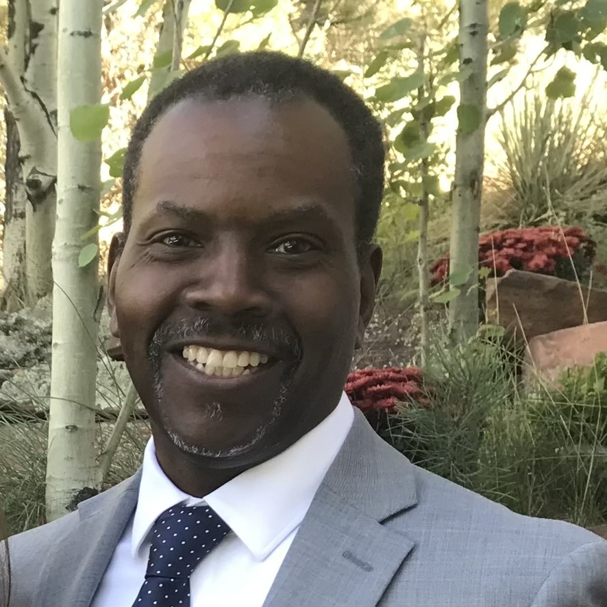 Selfie photo of a handsome man in a jacket and tie